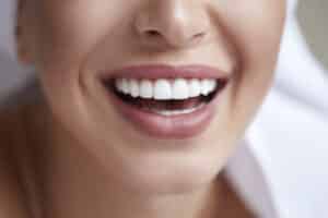 Natural-looking smile after tooth replacement.